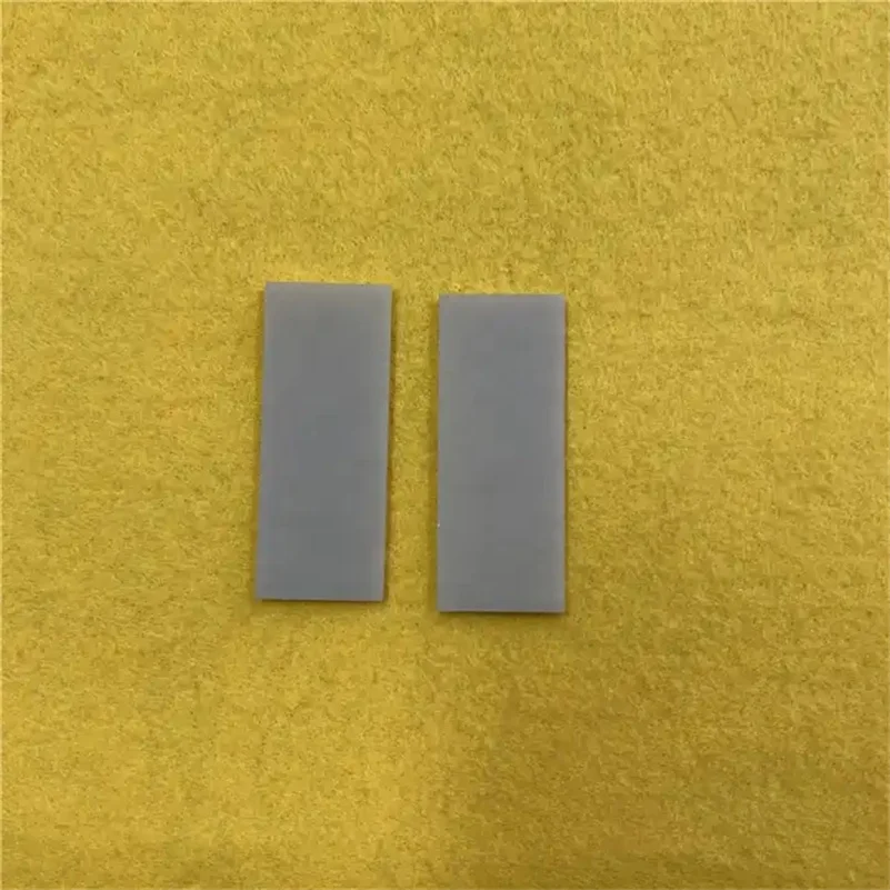 H020e93df547440969274b8063cdbee63S.webp Small Size High Thermal Conductivity ALN Ceramic Sheet Aluminum Nitride Ceramic Plate - Image 1