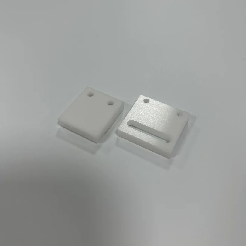 H0cefb1e930614457970efc419cdddb031.webp High Hardness Zirconia Ceramic Frame ZrO2 Ceramic Rectangular Plate - Image 1