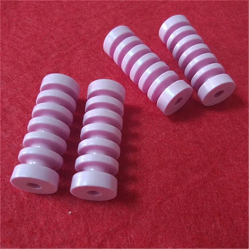 H0d0a35ef1efa4f699d6ac6af5d32a4a3e.webp High Wear Resistant Pink Textile Ceramic Guide Wheel Low Friction Alumina Ceramic Yarn Guide Pulley For Textile Industry - Image 1