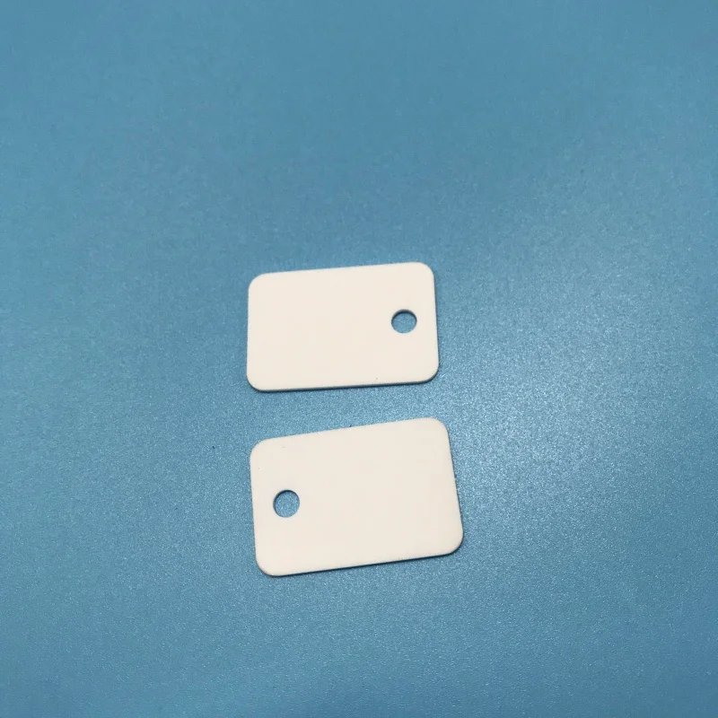 H0f02951c355c441c8f1394d2161456faQ.webp High Temperature Macor Ceramic Plate Machinable Glass Ceramic Thin Sheet - Image 1