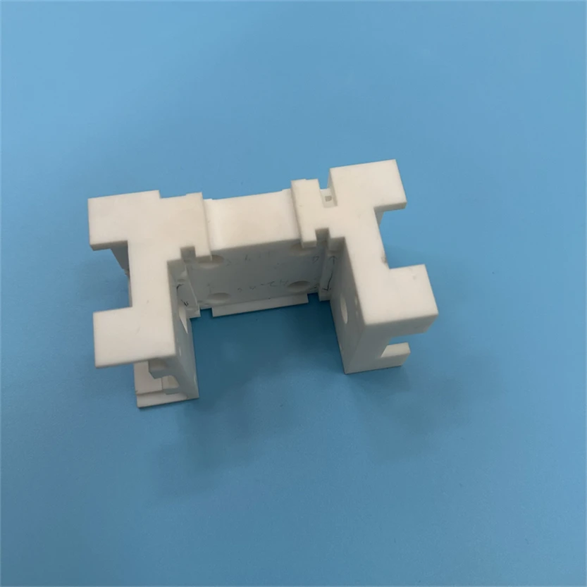 H16d14f9bace84535bb49fc03cda398193.webp Vacuum Insulation Medium Precision Machining Macor Ceramic Part Machinable Glass Ceramic Insulator - Image 1