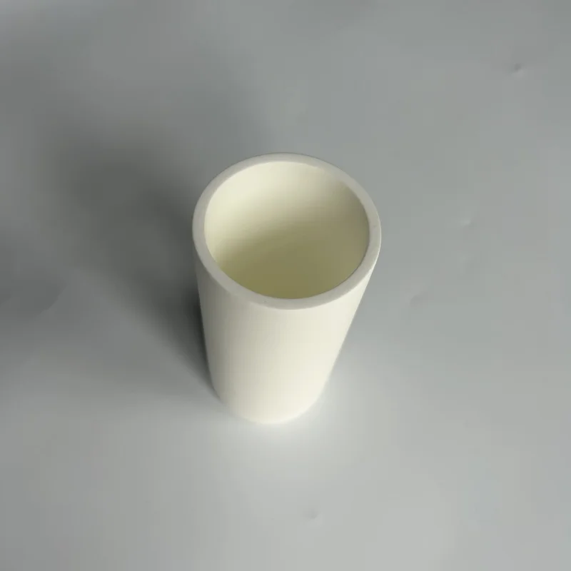 H63d83e5c6df44c45ae808de7c16faa810.webp High Purity Magnesia Ceramic Crucible Lab Analysis Magnesium Oxide Ceramic Melting Crucible - Image 1