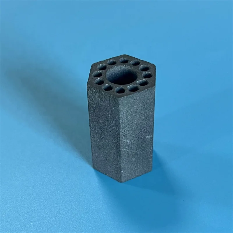 H87d50537014a46a896b5c94c96b1a1f01.webp Reaction Sintering Silicon Carbide Irregular Tube Insulator Black SiC Ceramic Hexagon Pipe - Image 1