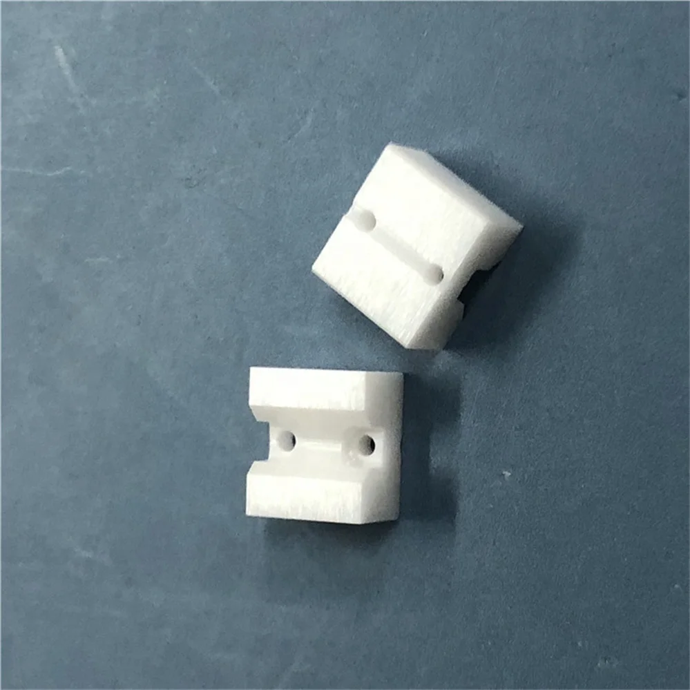 H87d8895a03764fccade8d5cb75d6d247d.webp High Temperature Industry Zro2 Zirconium Oxide Ceramic Block Zirconia Ceramic Part With Holes - Image 1
