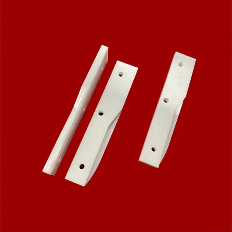 H888ed5fe95c64bc283ffb43128316c3ex.webp Customized Zirconia Irregular Plate Yttrium Stabilized ZrO2 Ceramic Part - Image 1