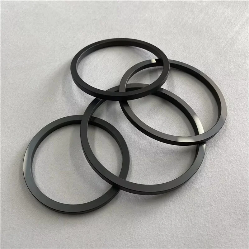 H91cbacd5f6ff44c08cb0f8af6f863ecaO.webp Surface Polishing Silicon Carbide Ring Insulator SiC Ceramic Seal Ring - Image 1