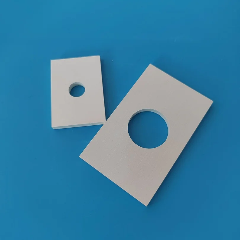 He2e2f887a9164d539d0dd783a0a3d831A.webp High Temperature Resistant Boron Nitride Ceramic Plate with a Central Hole - Image 1