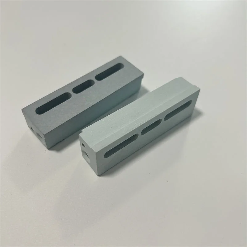 Hf0c284888a4943619487193db93dc7bck.webp Customized Abrasion Resistant Boron Nitride Ceramic BN Evaporation Boat for Industrial Use with Cutting Service - Image 1